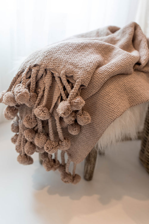 CAPRICE WOVEN THROW BLANKET WITH POM POM-THROW BLANKETS-BRAIDED CROWN